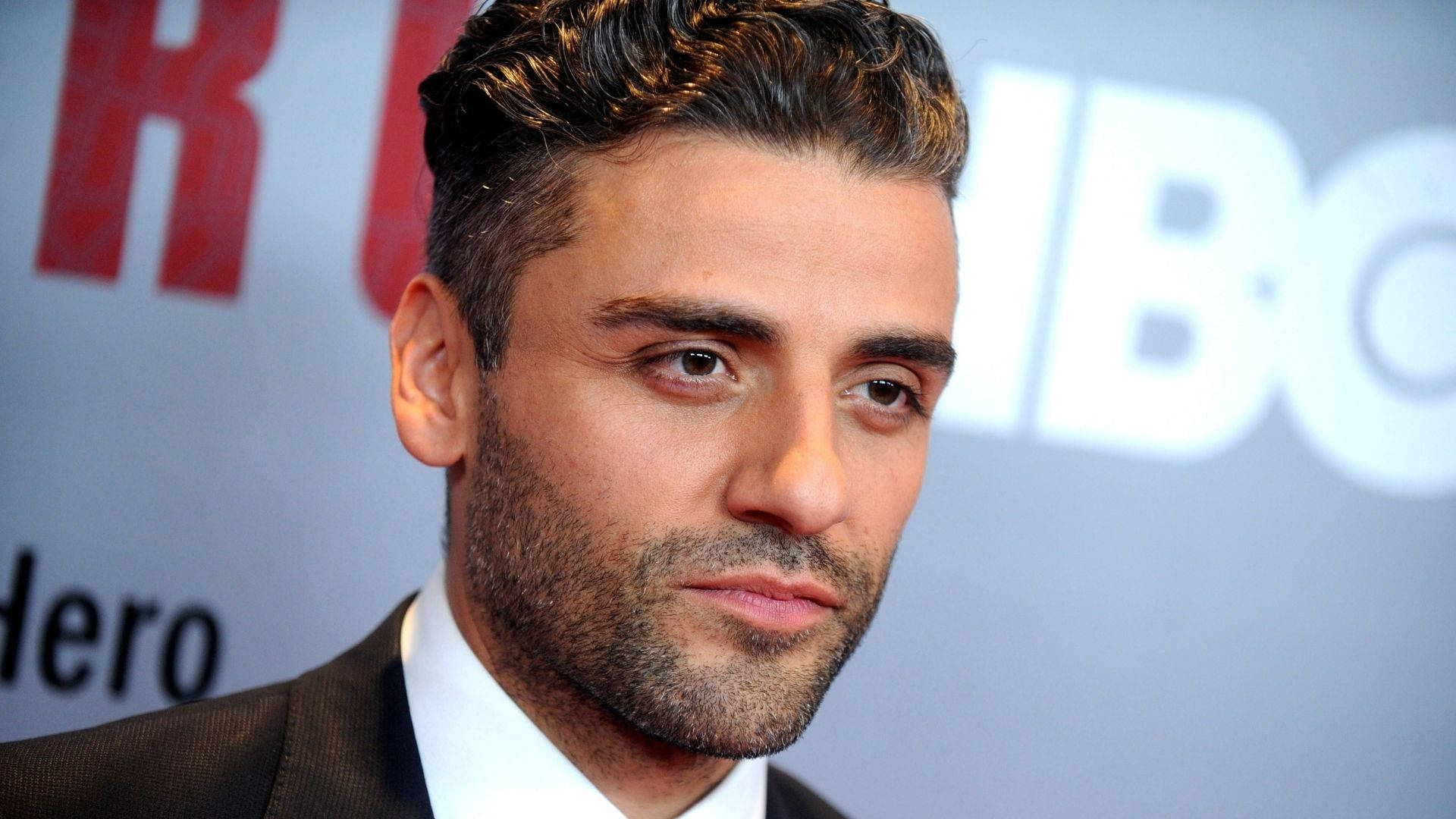 Oscar Isaac Alluring Stare Background