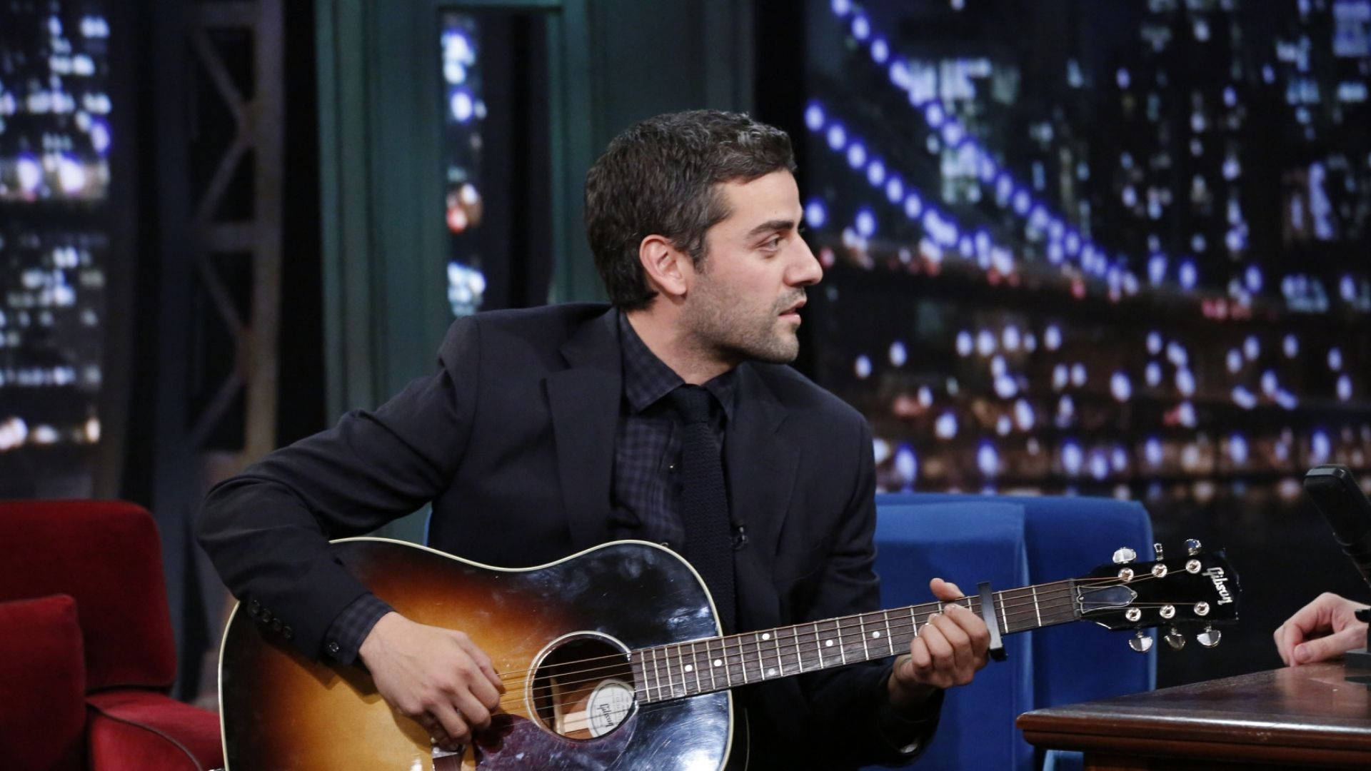Oscar Isaac Playing Guitar Background