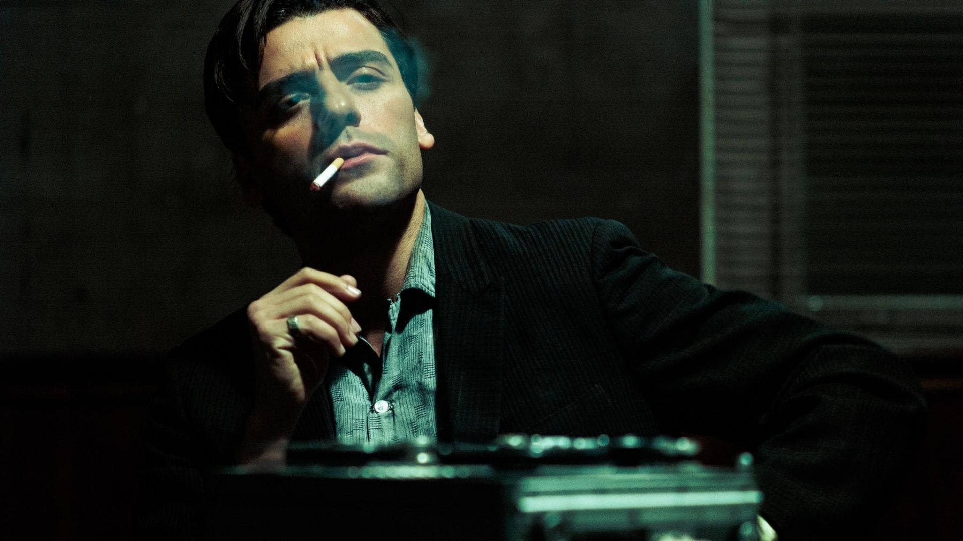 Oscar Isaac Smoking A Cigar Background
