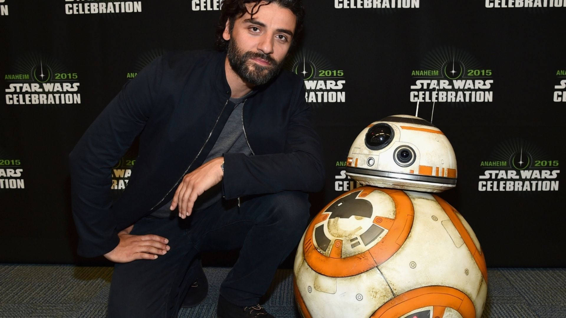 Oscar Isaac With Star Wars Robot Background