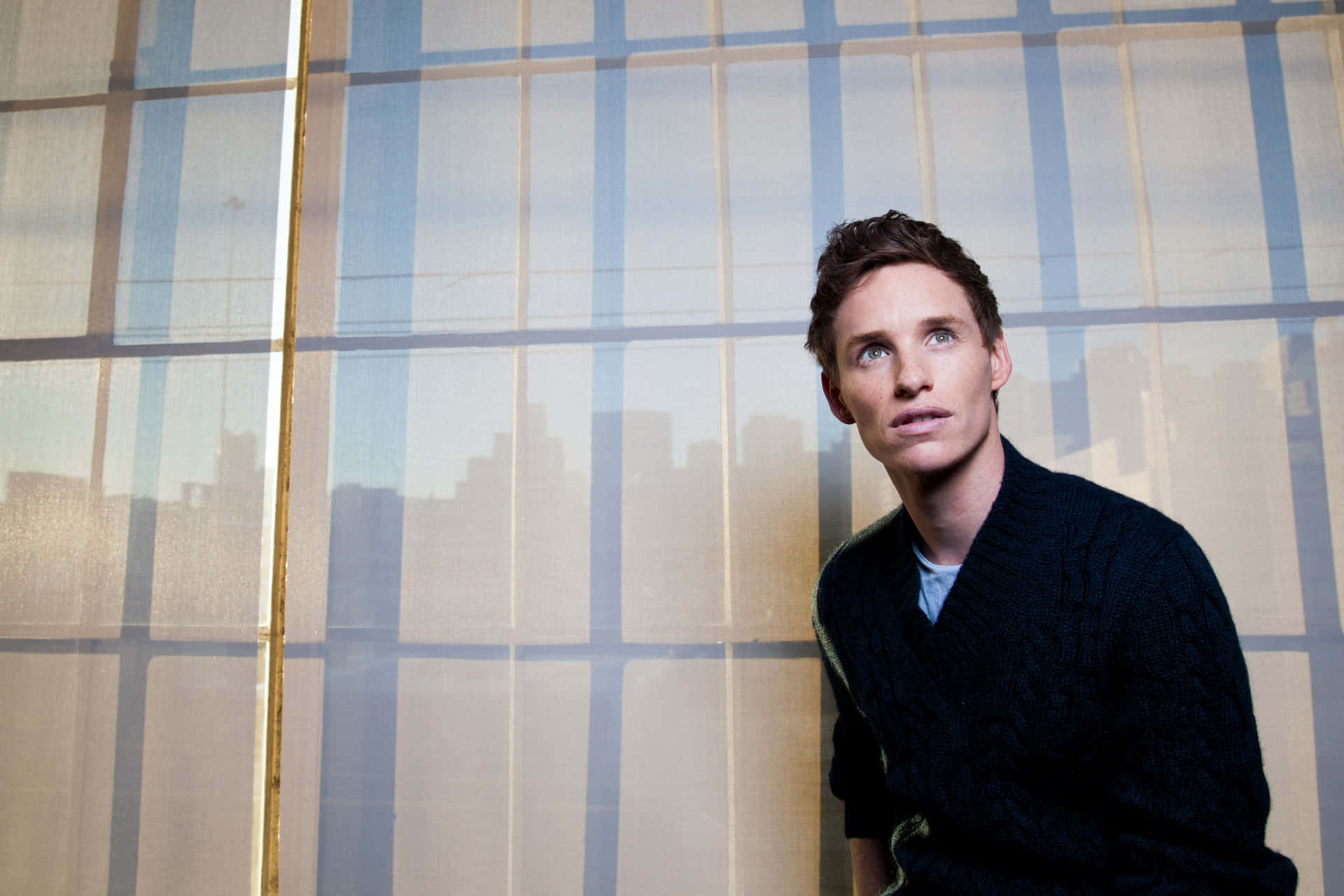 Oscar-winning British Actor Eddie Redmayne Looking Dapper In A Suit Background