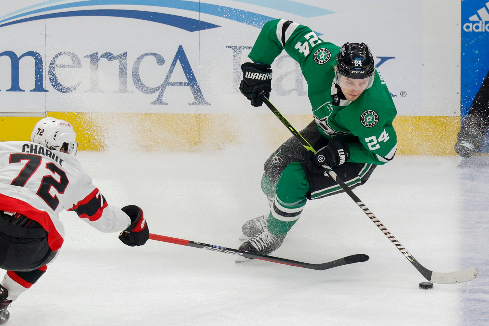 Ottawa Senators Defenseman Thomas Chabot In Action Against Dallas Stars Background