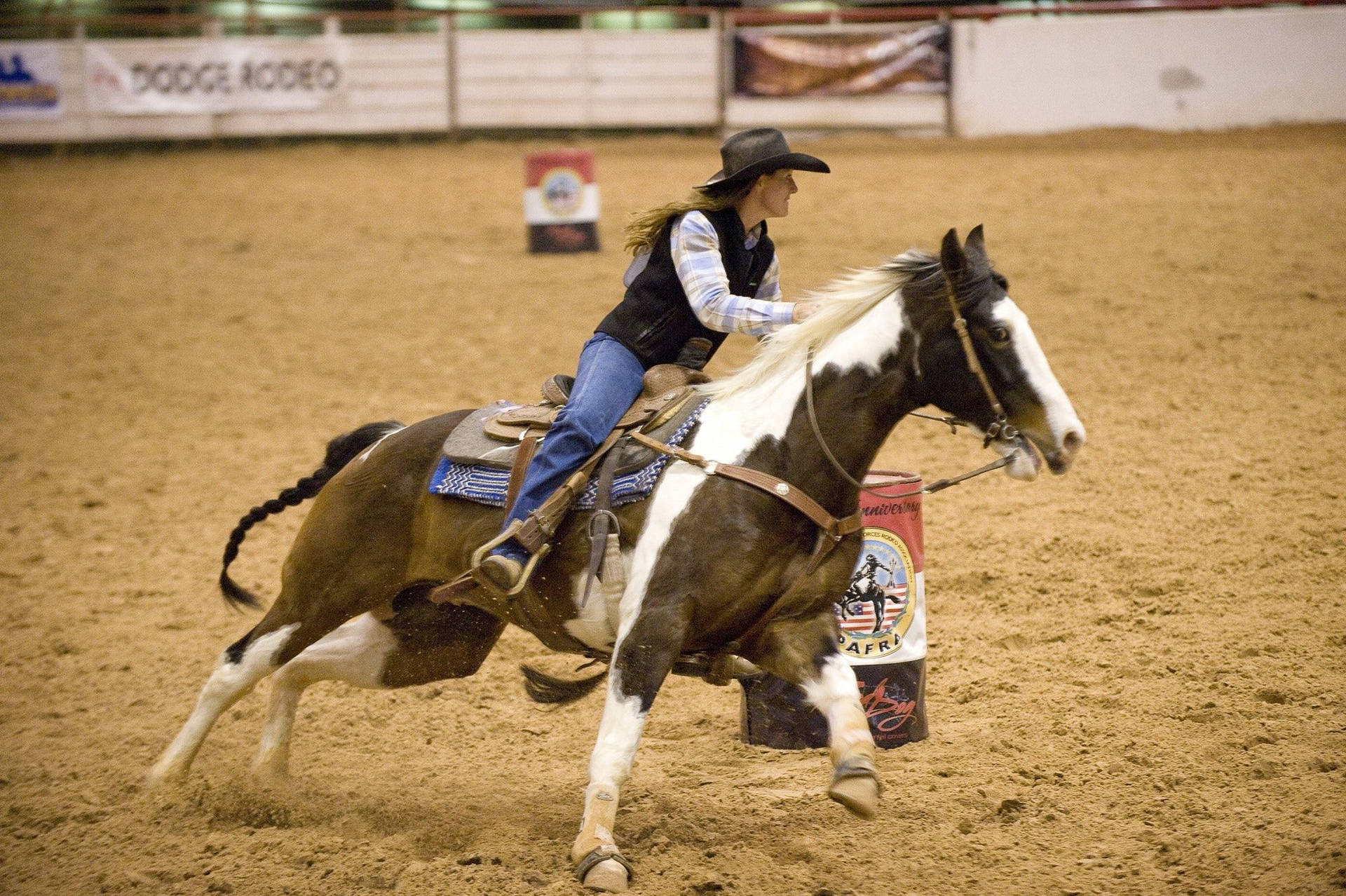 Our Champion Barrel Racer Paige Kuester Celebrates Her Latest Win With Her Beloved Horse. Background