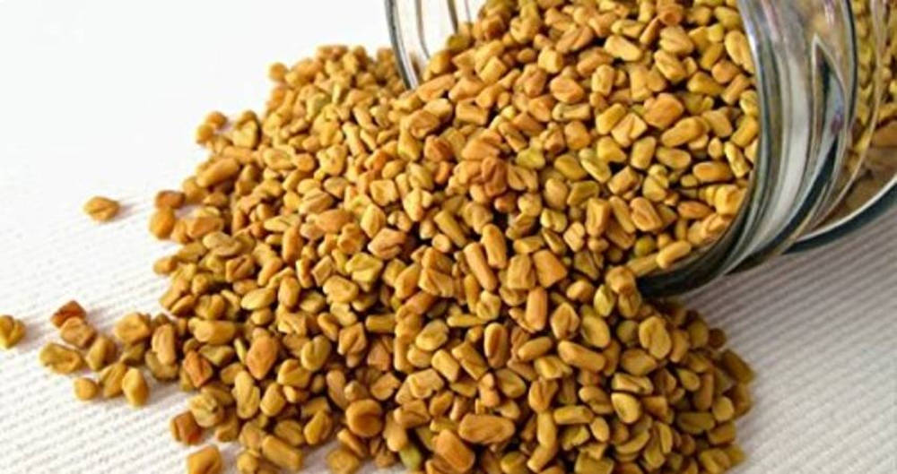 Overflowing Jar Of Fenugreek Seeds On Rustic Wooden Table Background