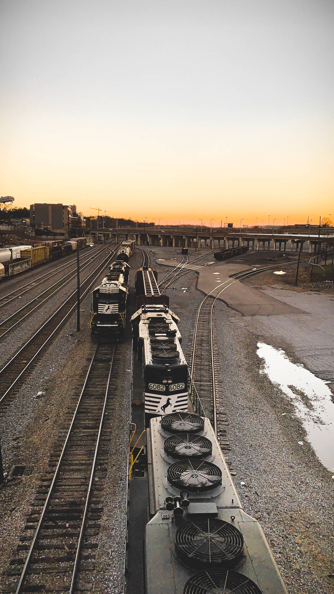 Overhead View Of Railroad Tracks And Trains Background
