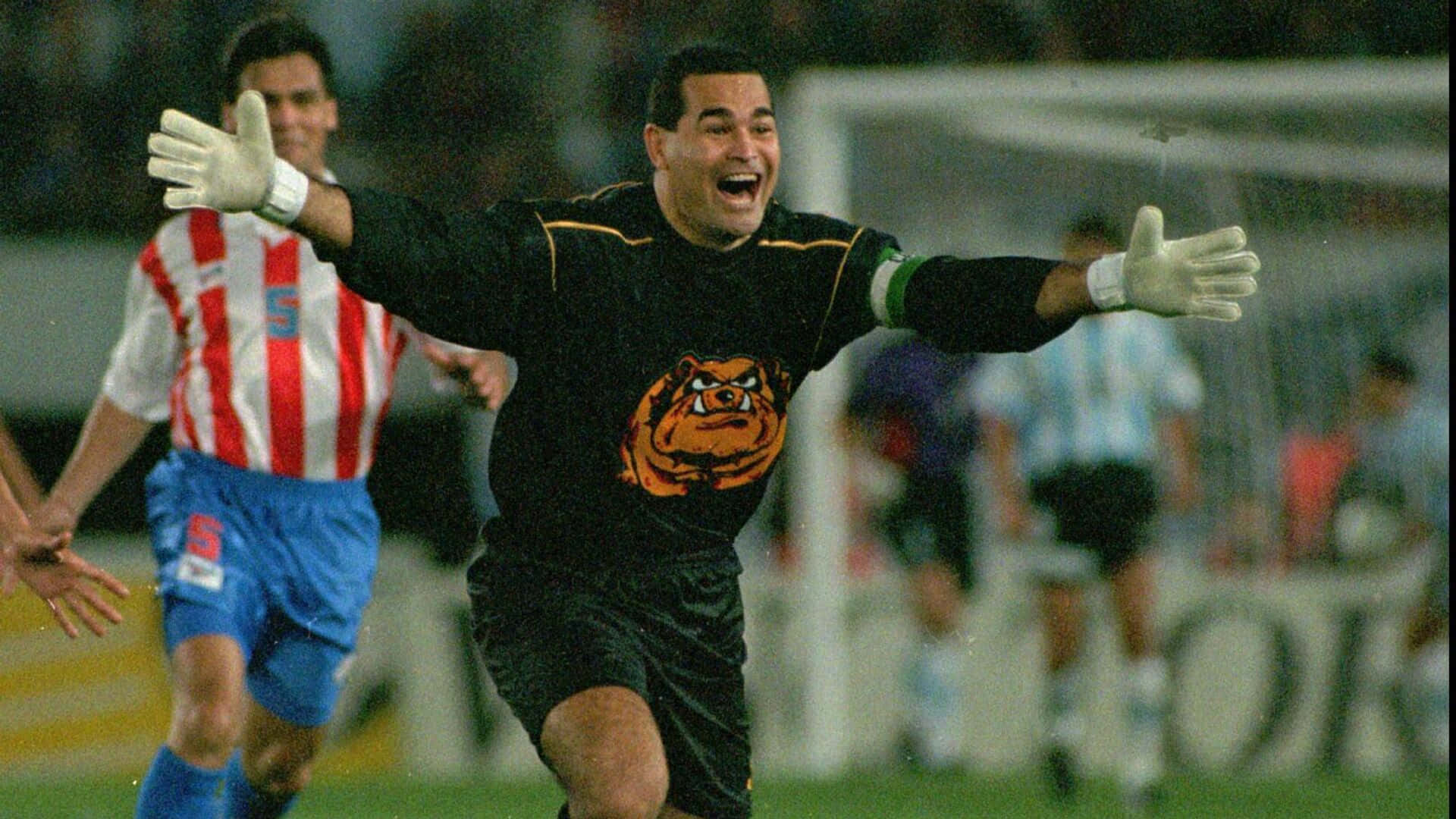Overjoyed Paraguayan Footballer Jose Luis Chilavert Medium Angle Shot Background
