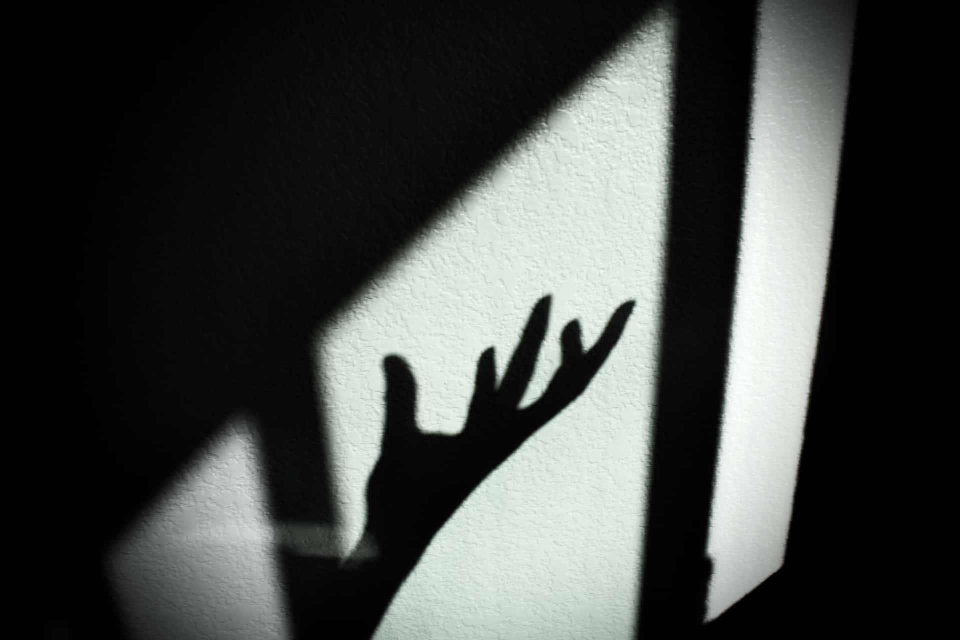 Overwhelmed Person's Hand Shadow