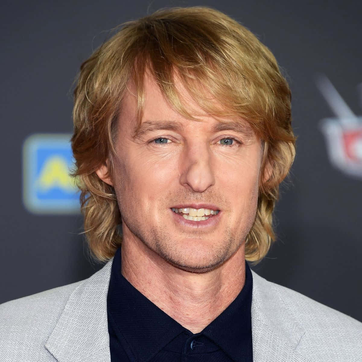 Owen Wilson Cackling In Joy Background