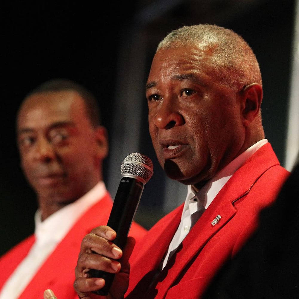 Ozzie Smith In Red Suit Background