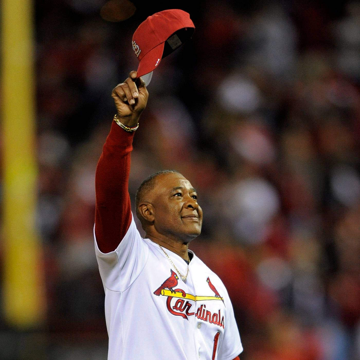 Ozzie Smith Raises Baseball Cap Background