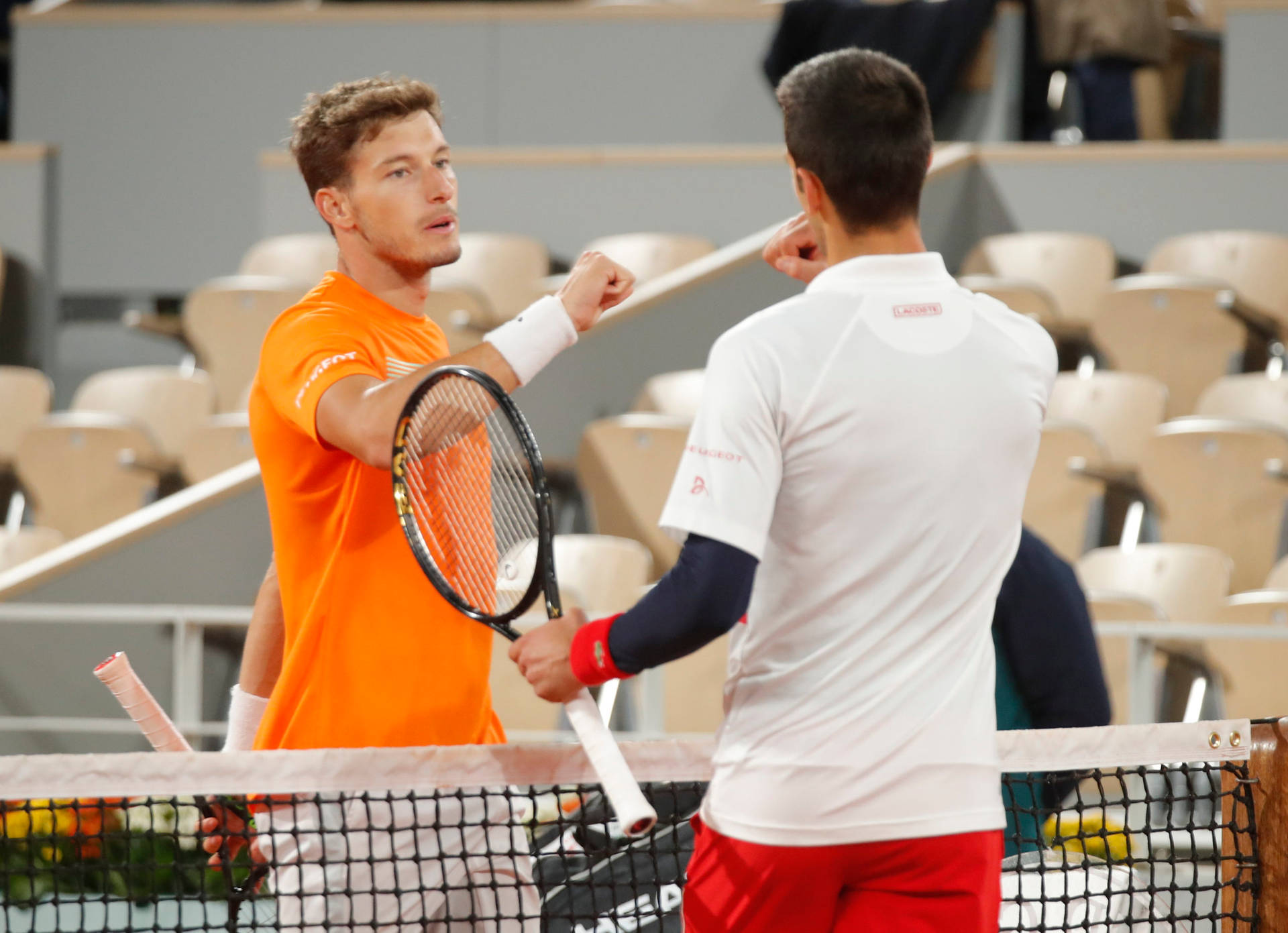 Pablo Carreno Busta Doing Fist Bump Background