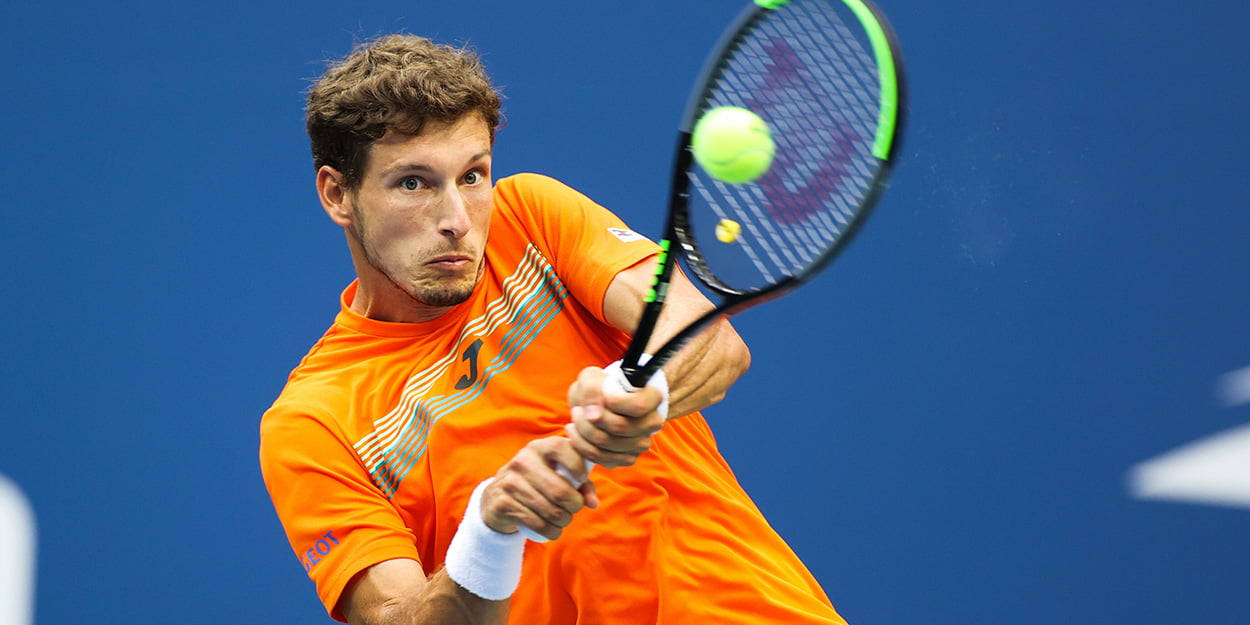 Pablo Carreno Busta Hitting The Ball Background