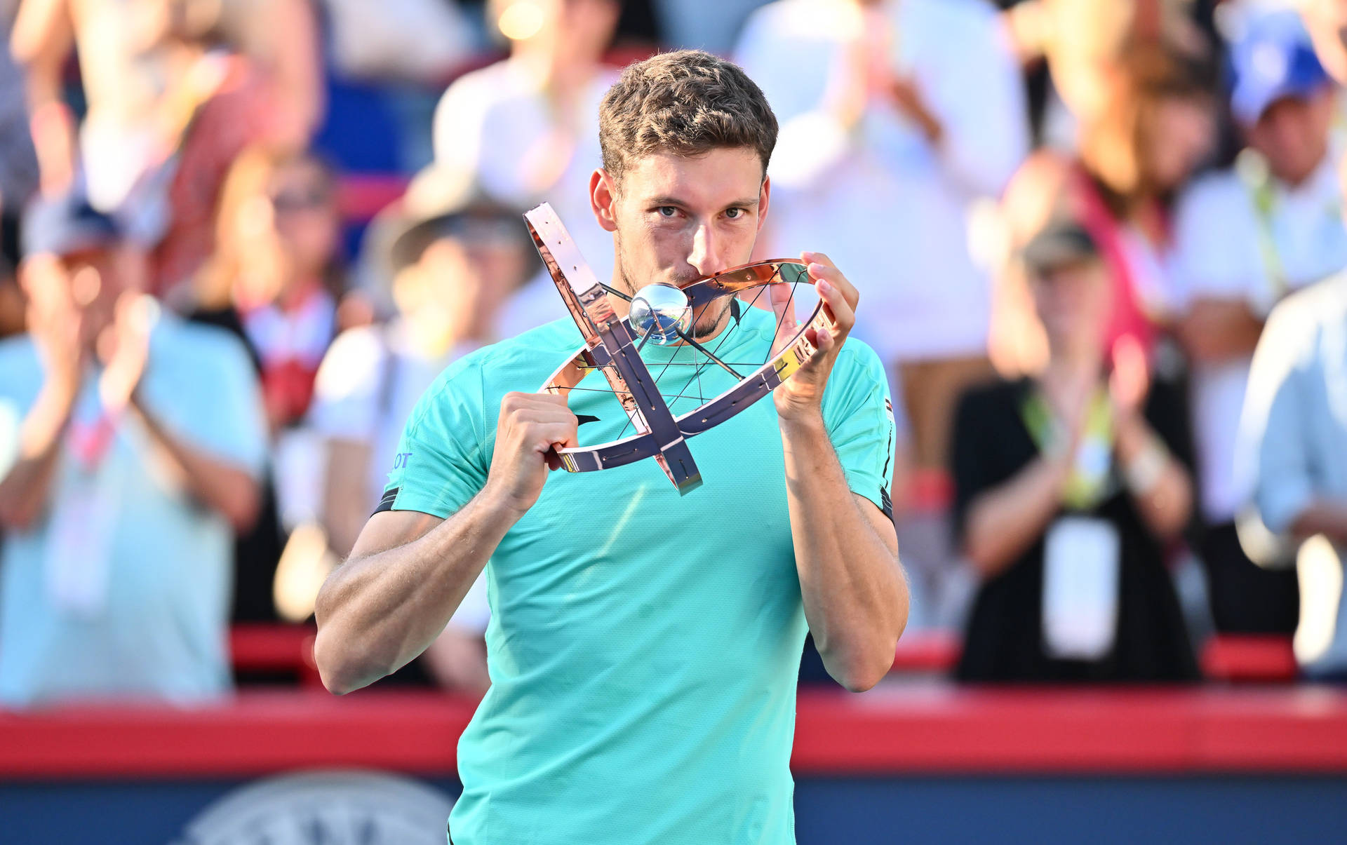 Pablo Carreno Busta Kissing His Trophy Background