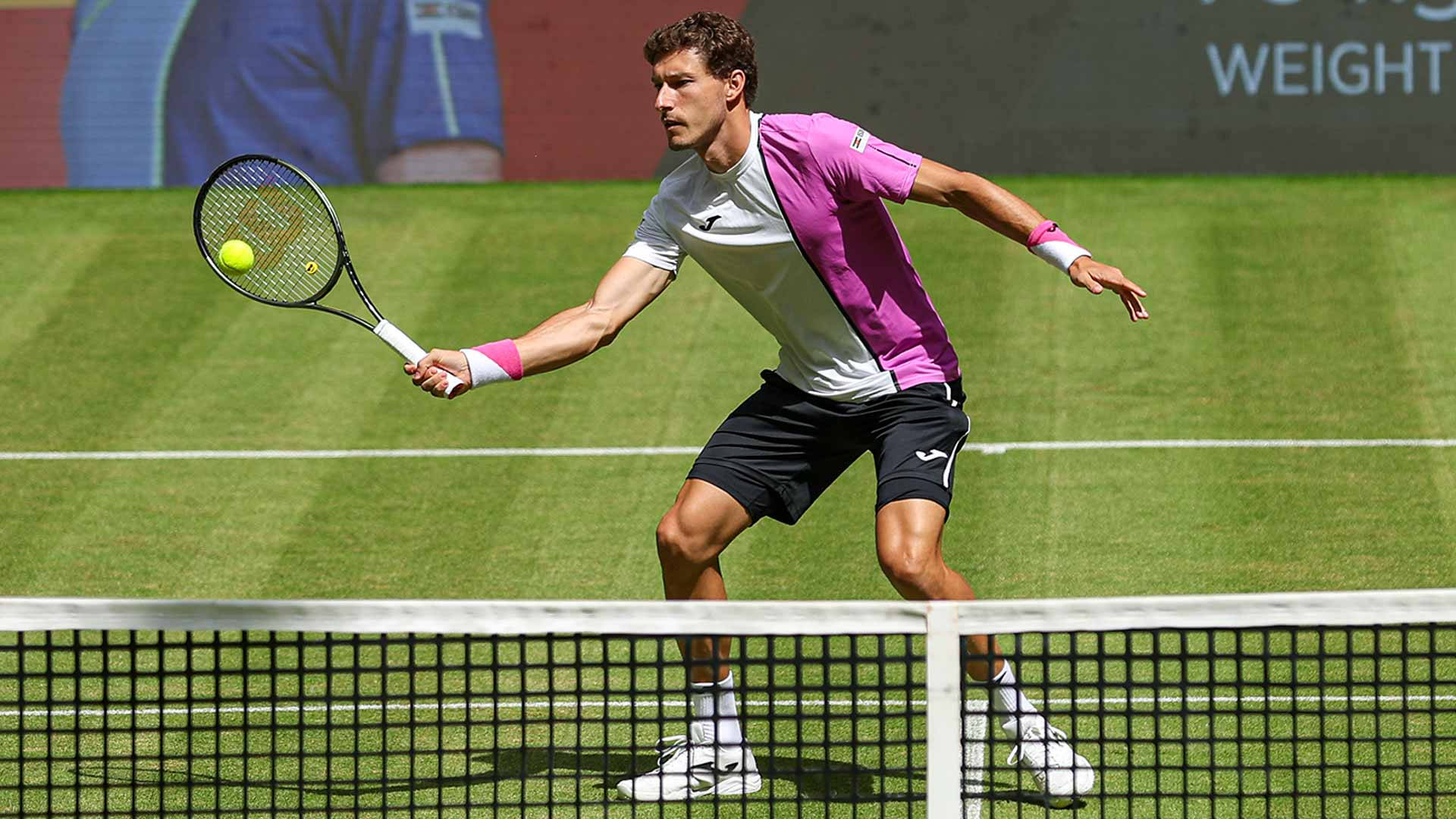 Pablo Carreno Busta Wearing A Purple Shirt Background