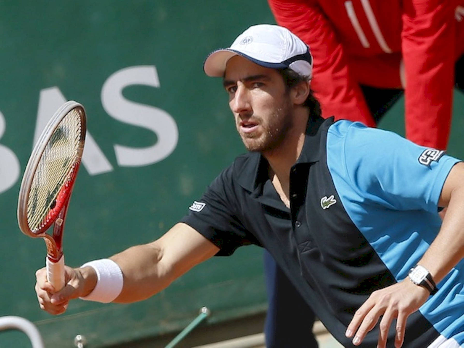 Pablo Cuevas Holding Tennis Racket Background