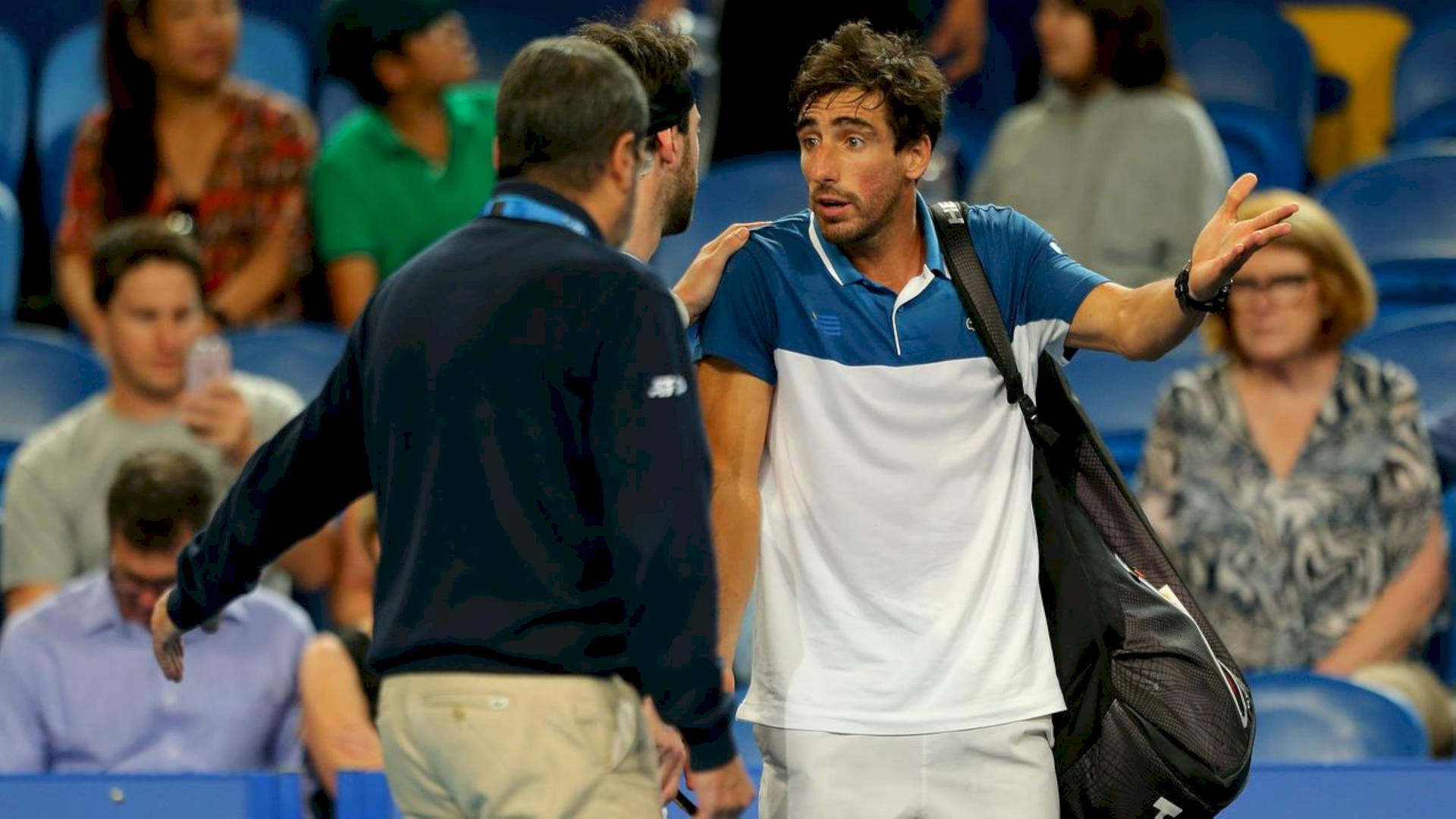 Pablo Cuevas In Action Against Nikoloz Basilashvili Background