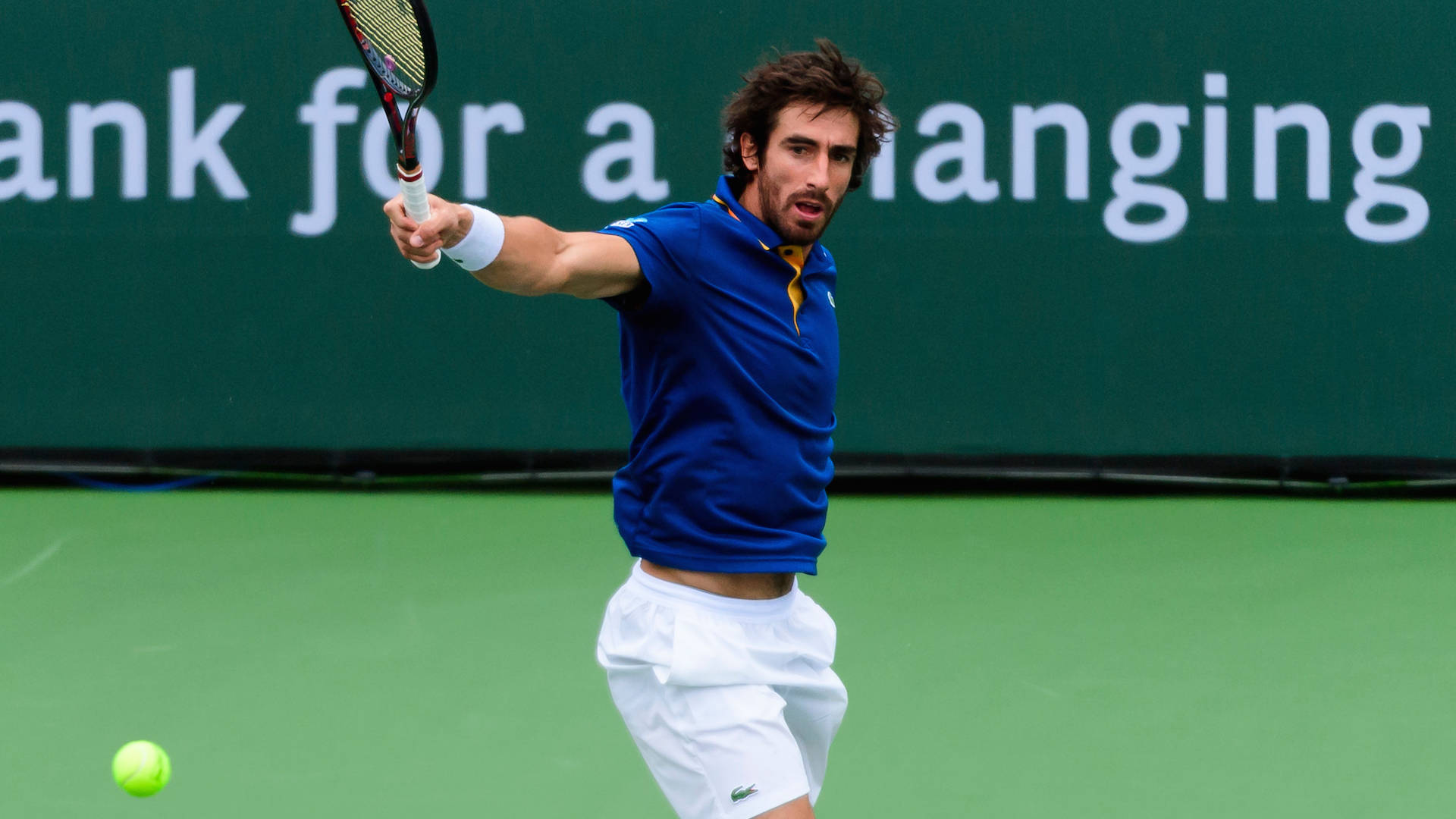 Pablo Cuevas Playing Inside Court Background