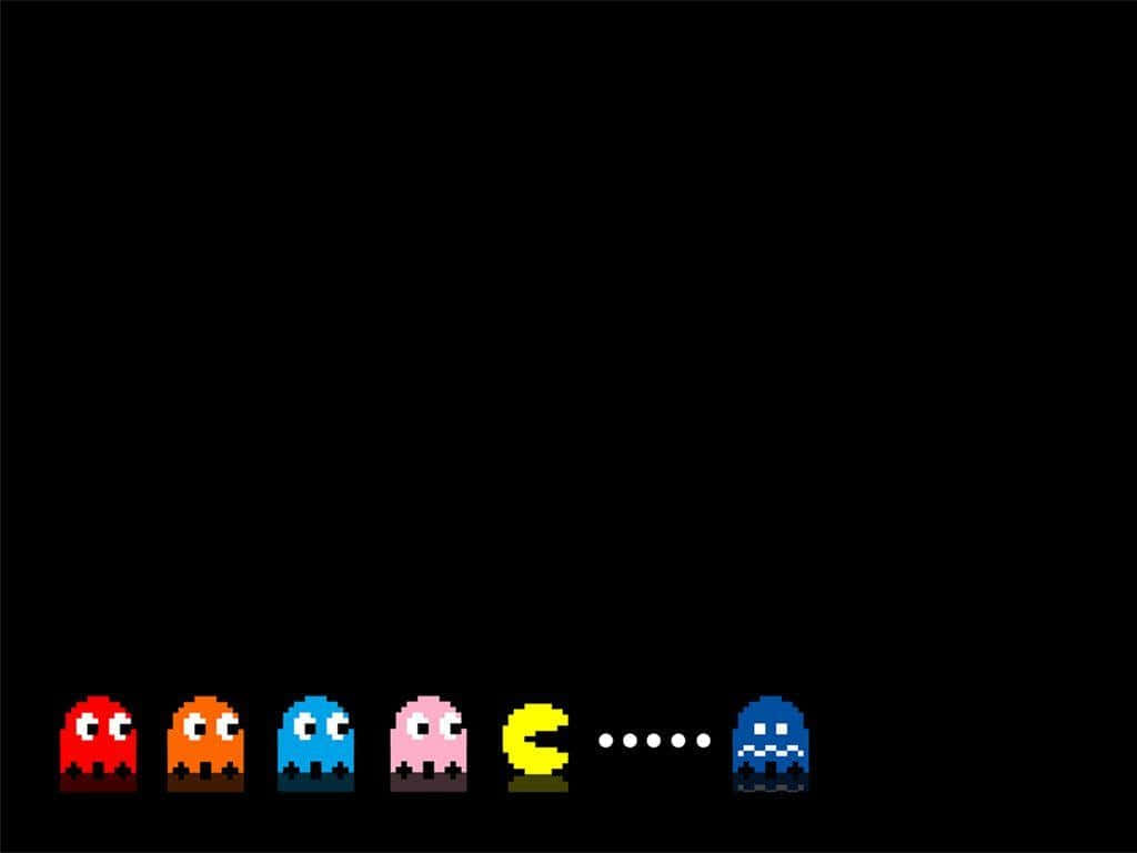 Pac Man Being Chased By Ghosts Background