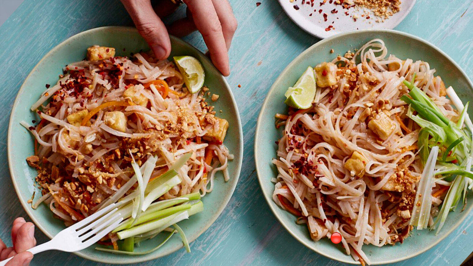 Pad Thai On Blue Platters With Spring Onions