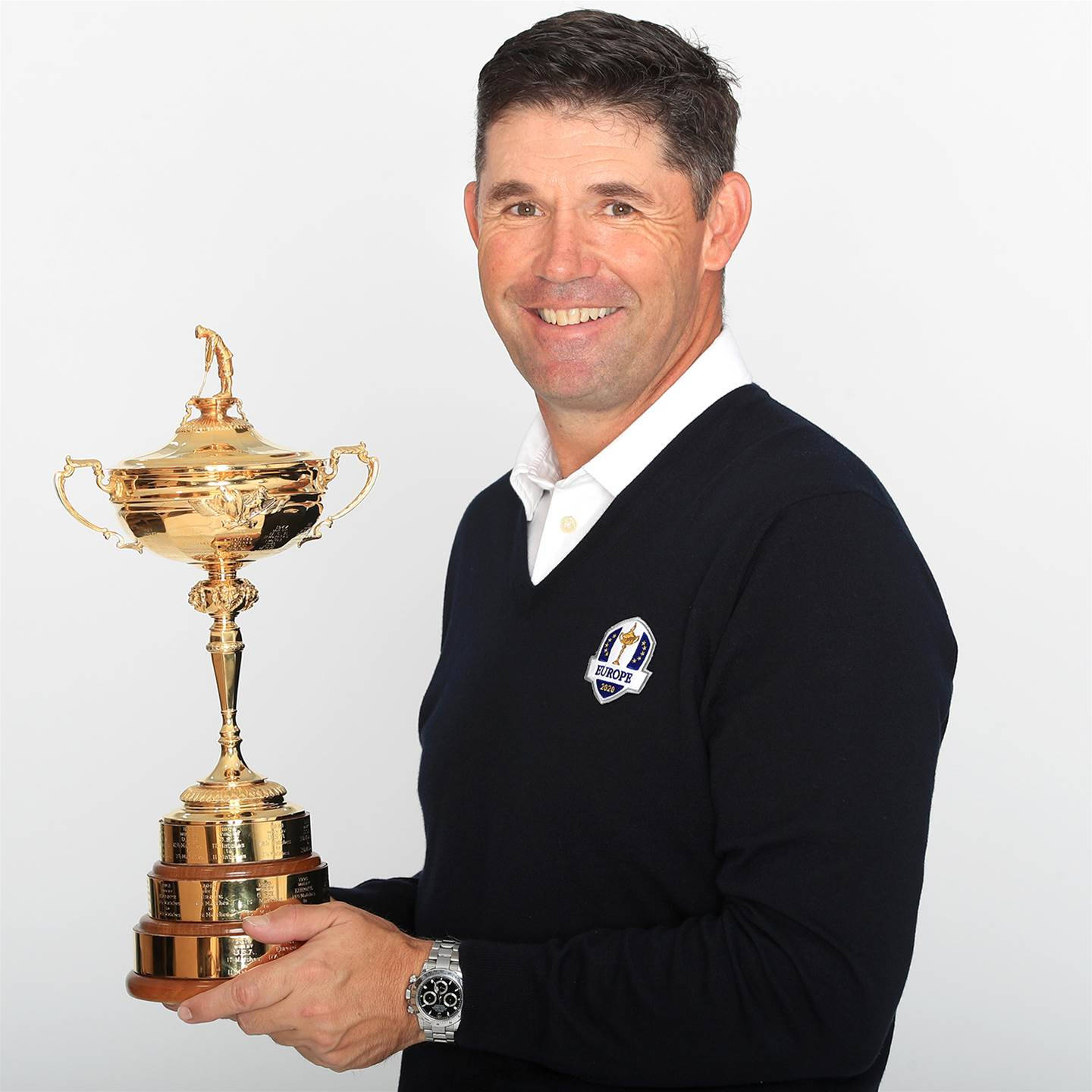 Padraig Harrington Celebrating With Golden Trophy Background