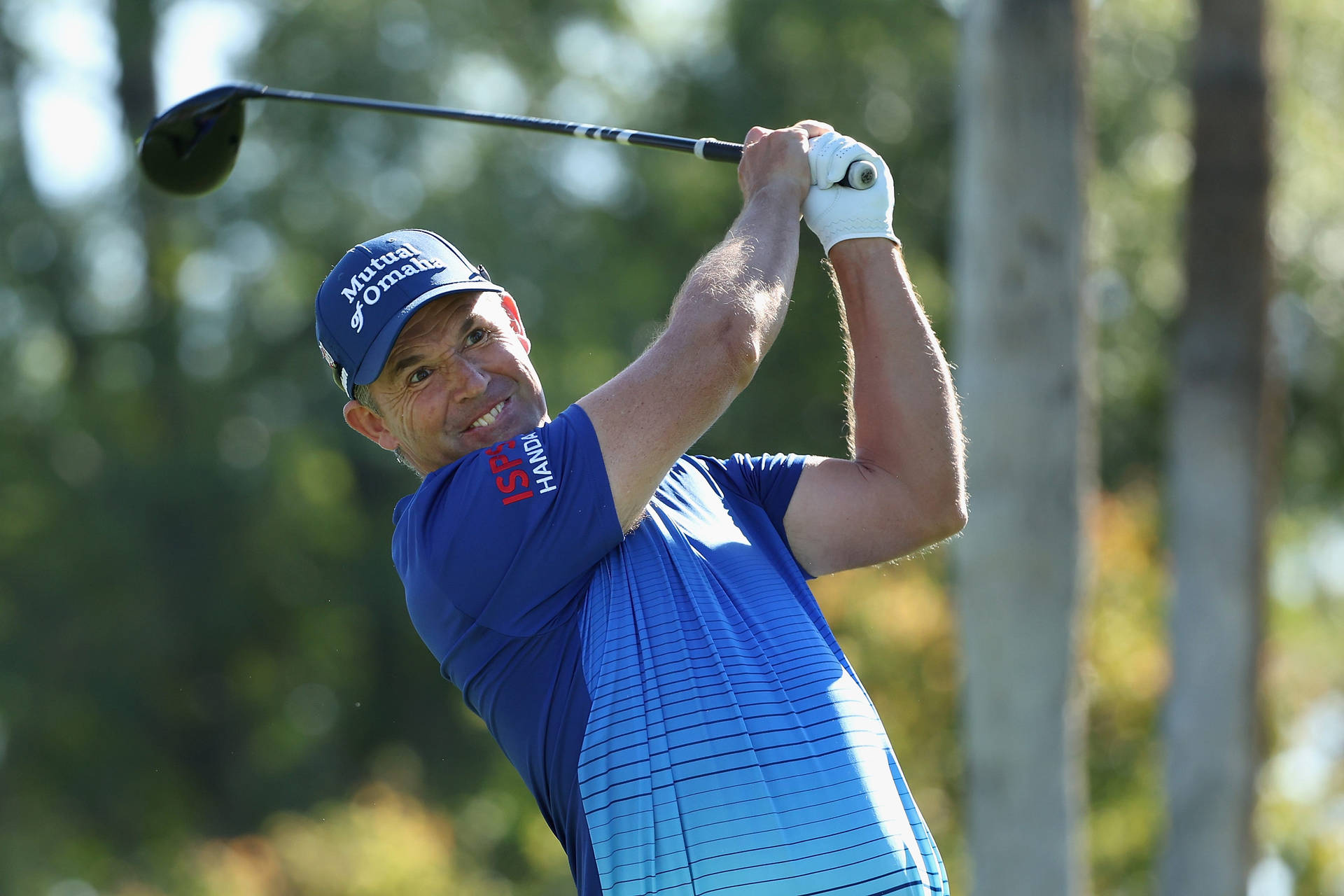 Padraig Harrington Expressing A Quirky Moment Background