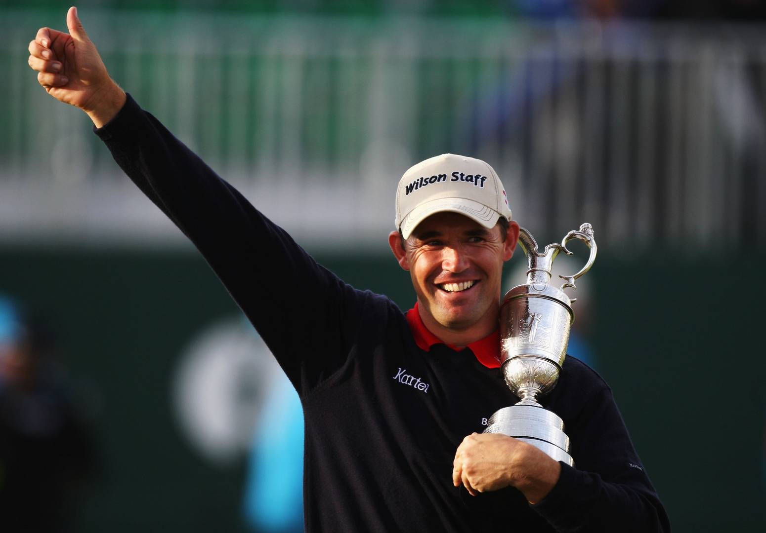 Padraig Harrington Giving A Thumbs Up Background