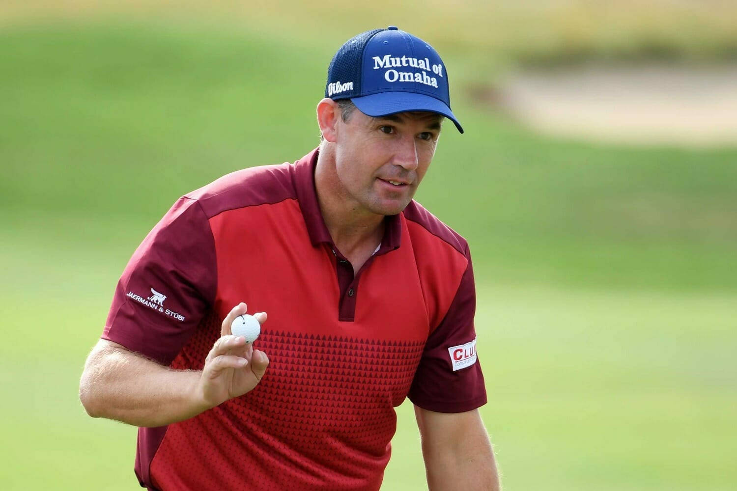 Padraig Harrington Holding Golf Ball Background