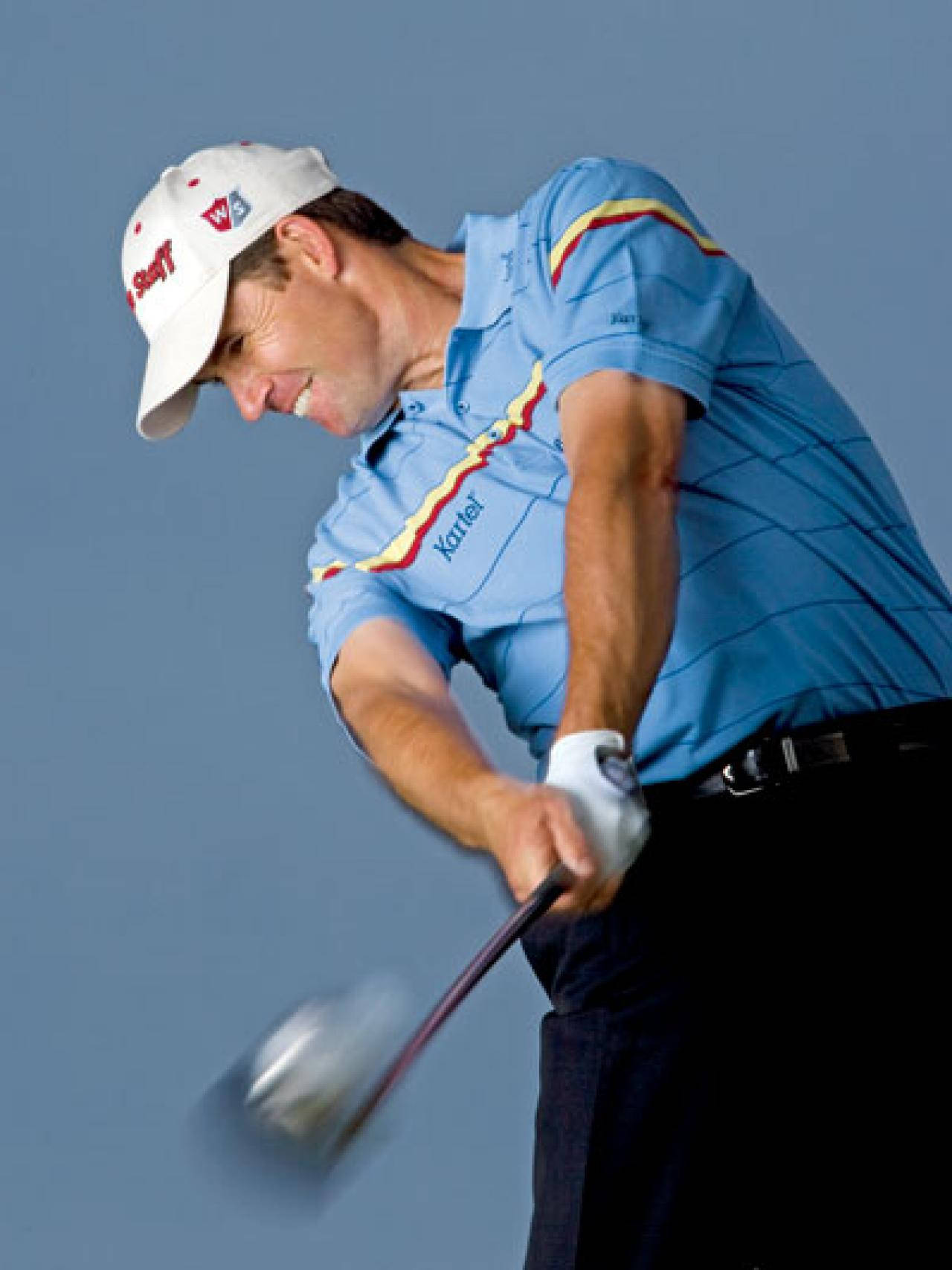 Padraig Harrington Smiling And Swinging Background