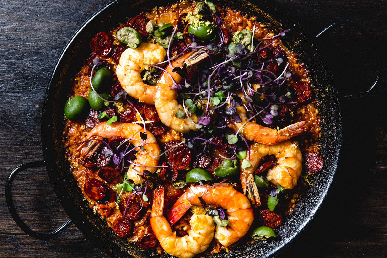 Paella Dish With Prawns And Olives Background