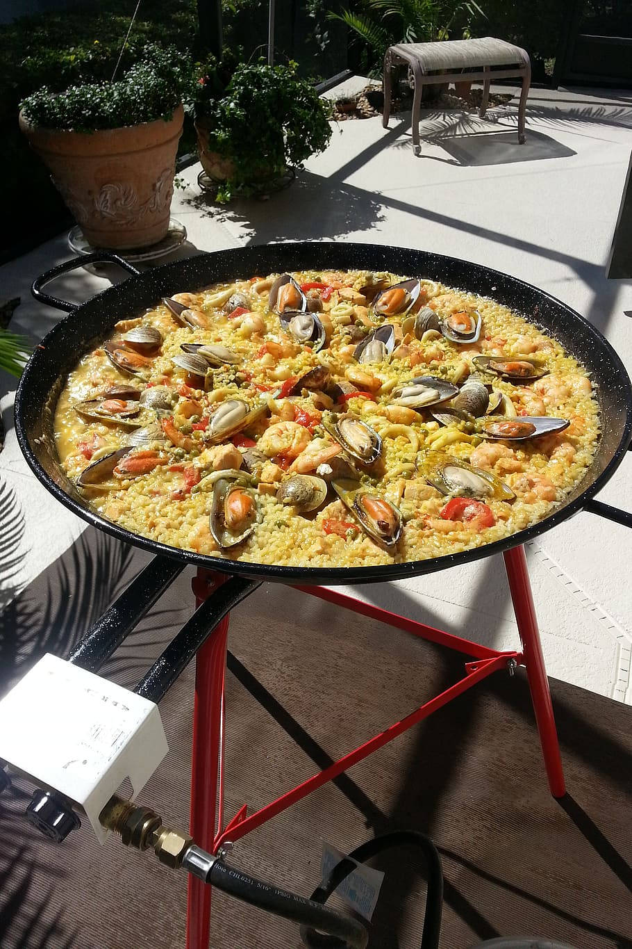 Paella Rice Dish On Grill Background