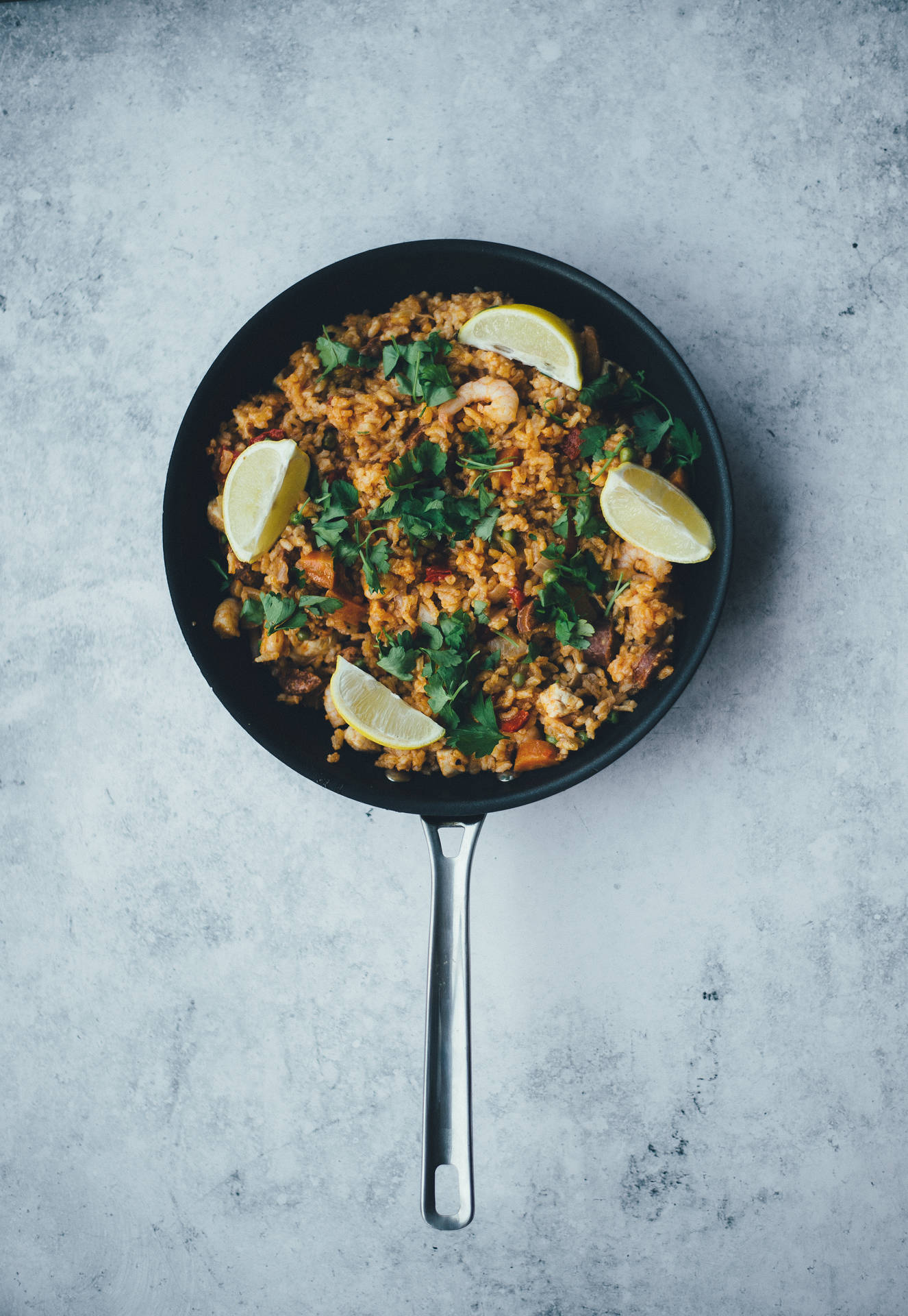 Paella With Coriander And Limes Background