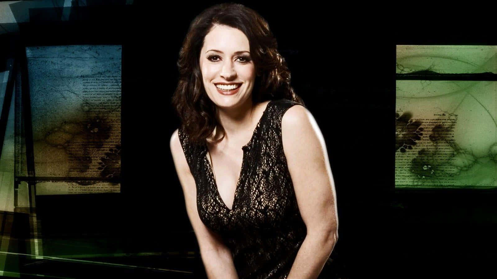 Paget Brewster Posing For A Photoshoot Background