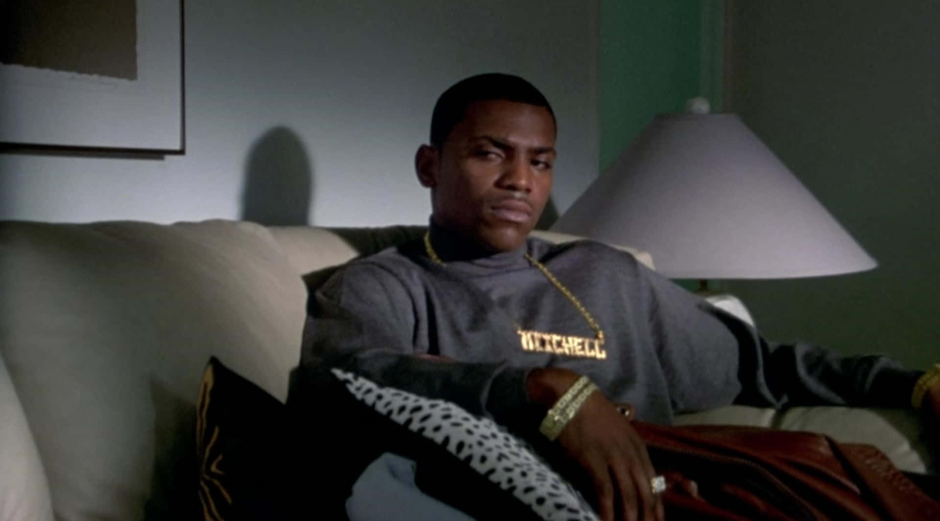 Paid In Full Movie Scene Character On Couch Background