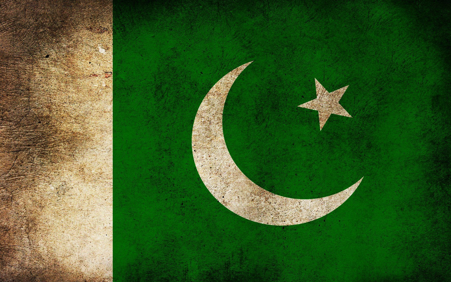 Pakistan Flag With Black Smudges Background