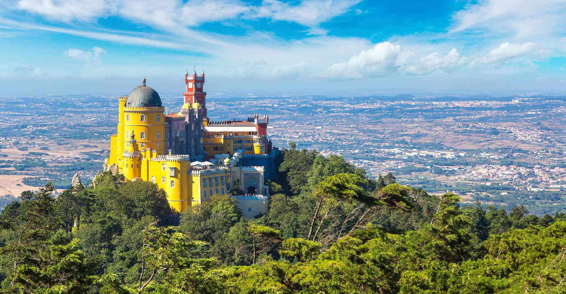 Palácio Da Pena Under The Beautiful Blue Sky In Sintra, Portugal Background