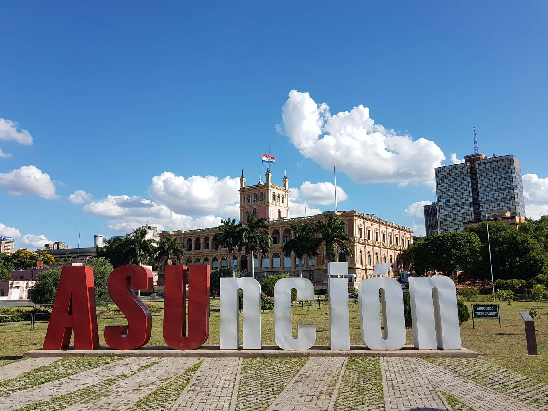 Palacio De Lopez In Asuncion On A Sunny Day Background