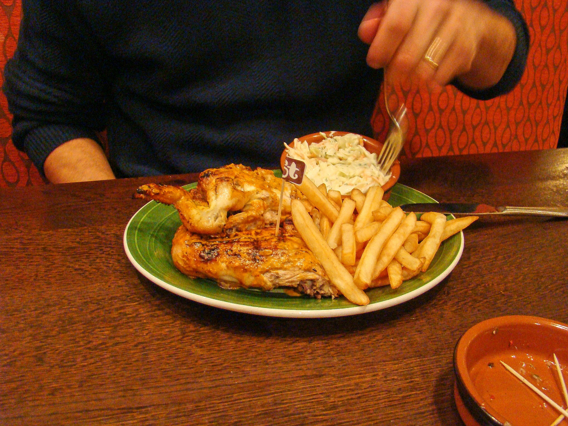 Palatable Peri Peri Chicken With Fries And Coleslaw Background