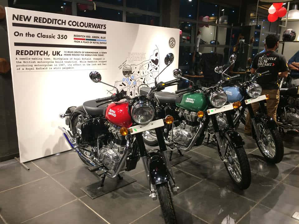 Palpable Shimmer Of Royal Enfield Motorcycles Background
