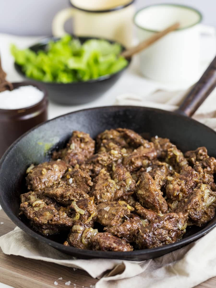 Pan Of Chicken Livers With Onion Background