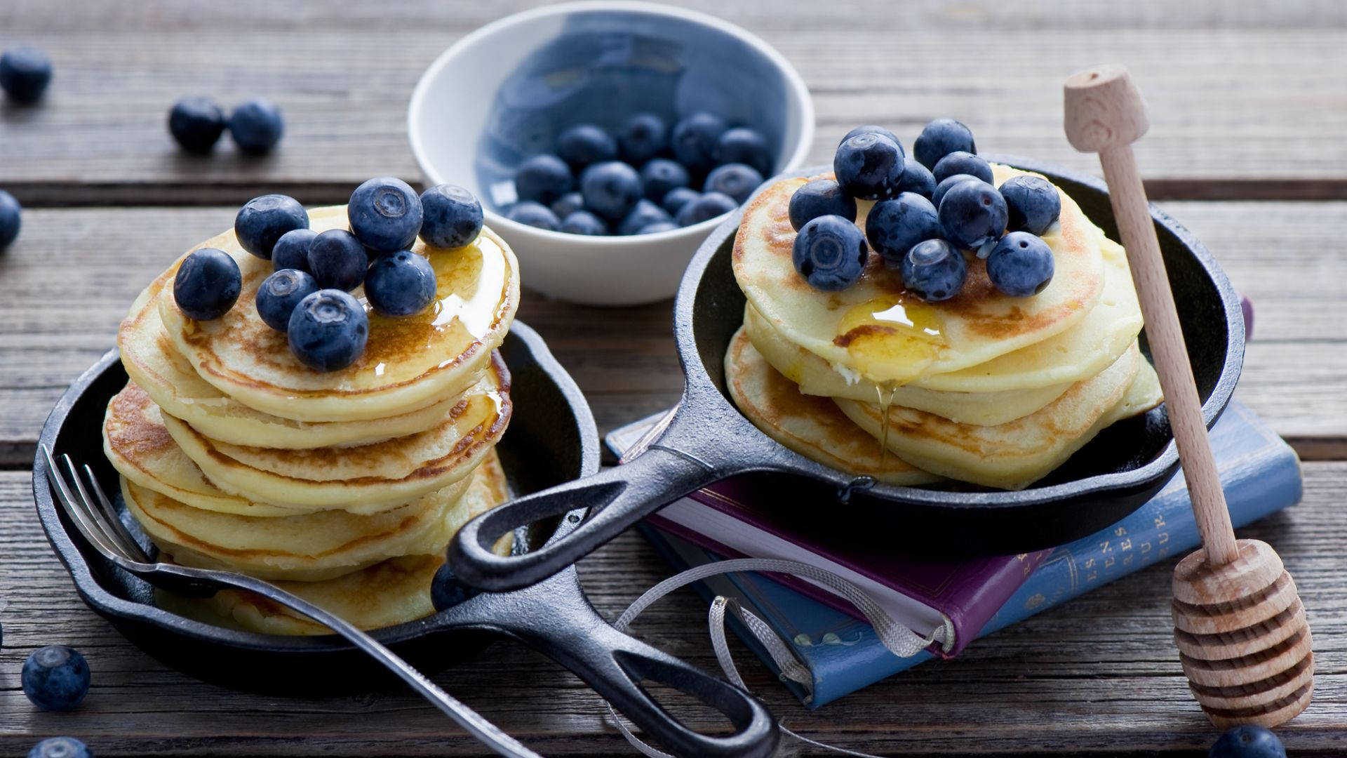 Pancakes On Pan With Berries Background
