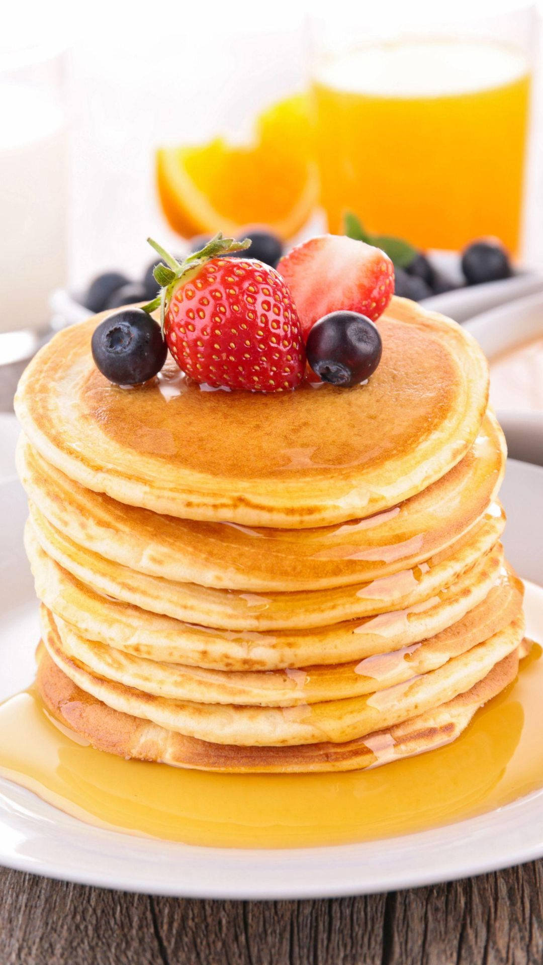 Pancakes On Plates With Honey Background