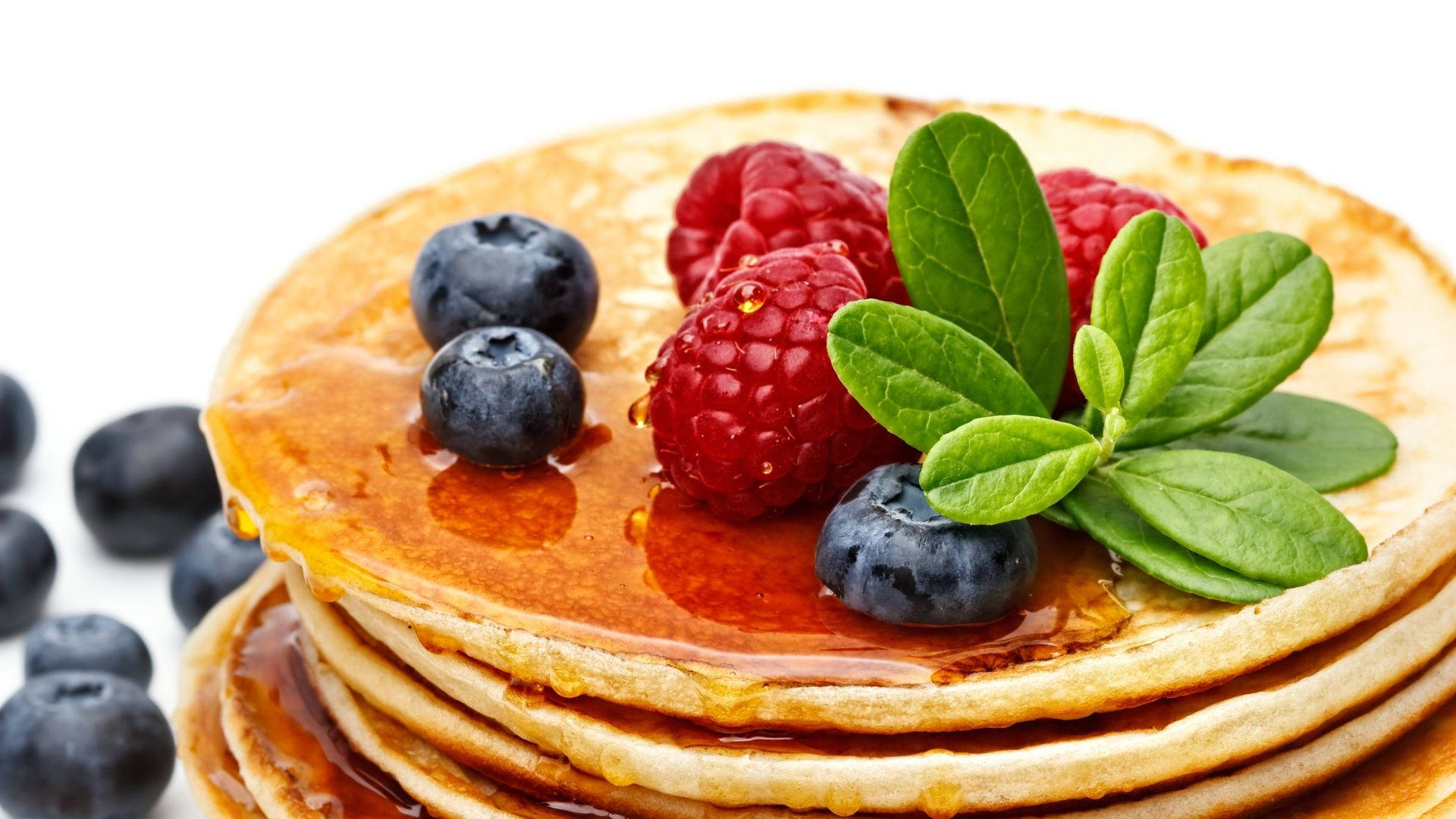 Pancakes Topped With Berries Background