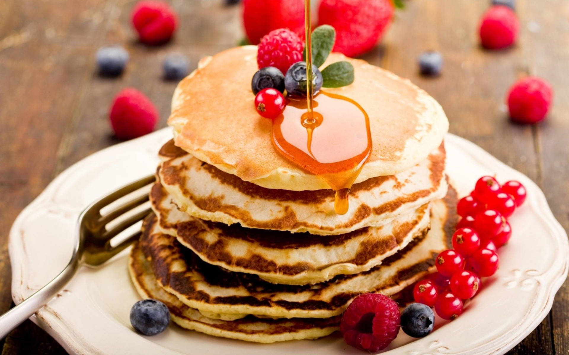 Pancakes With Berries On Plate