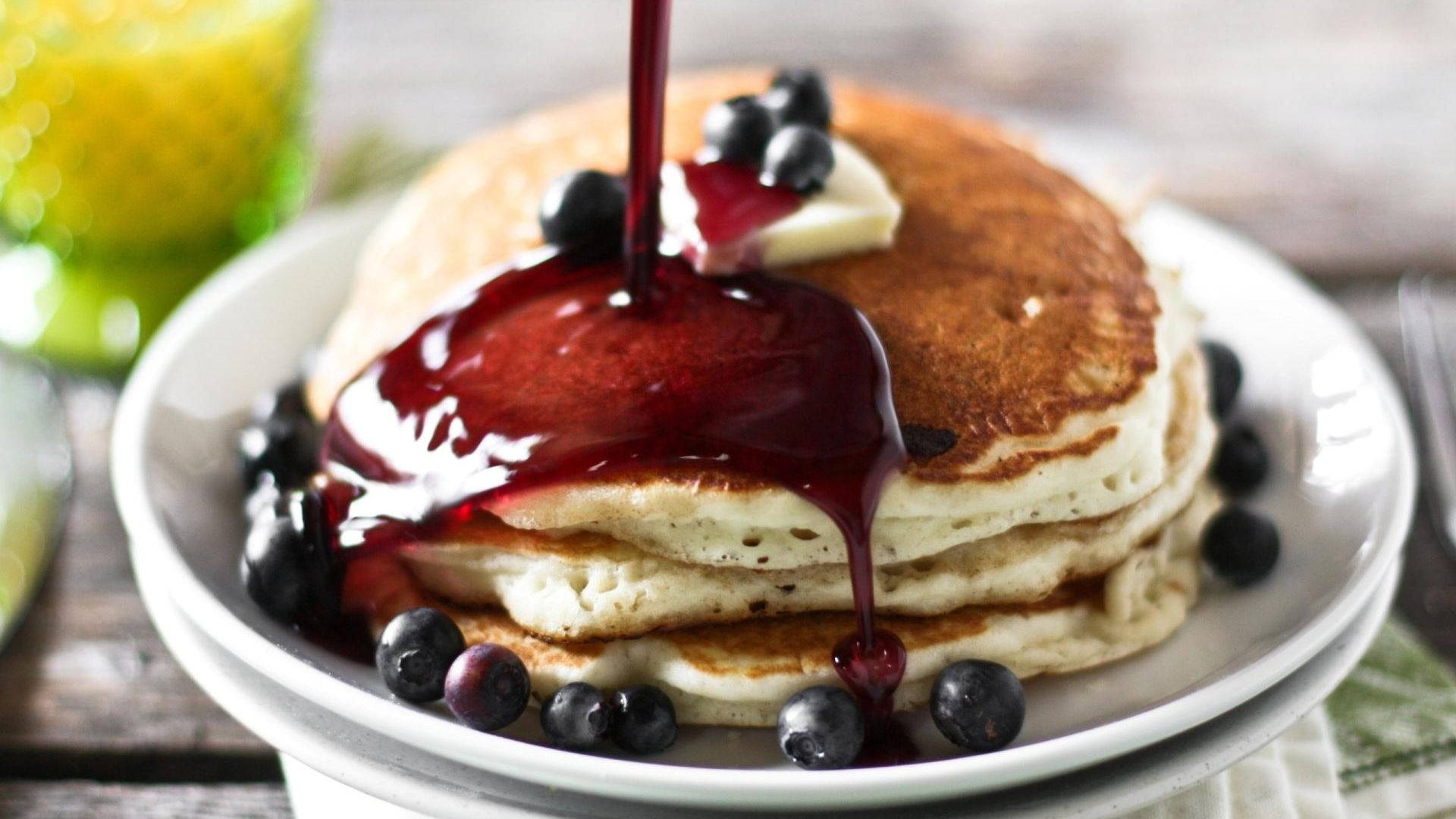 Pancakes With Berry Syrup Background