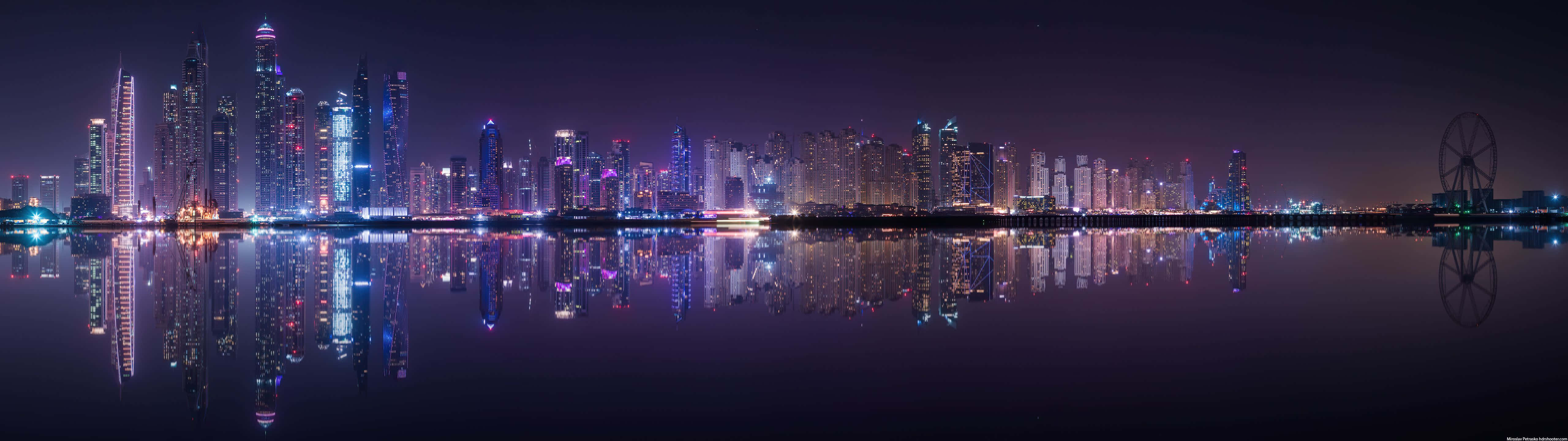 Panoramic Nighttime Cityscape Reflection Background