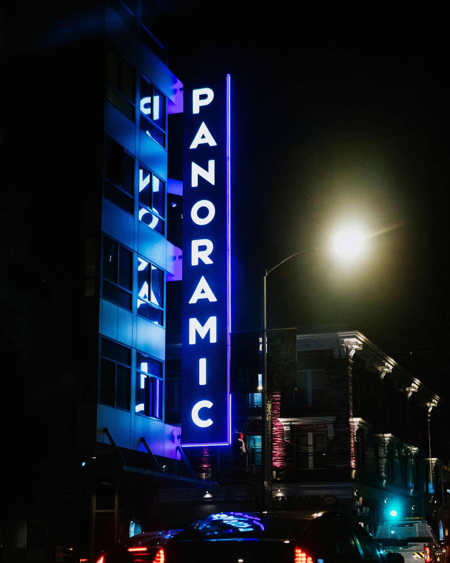 Panoramic Signage In Neon Blue Iphone Background