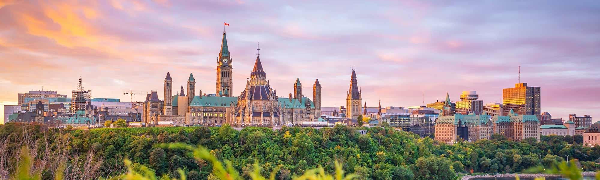 Panoramic View Of Parliament Hill In Ottawa Background