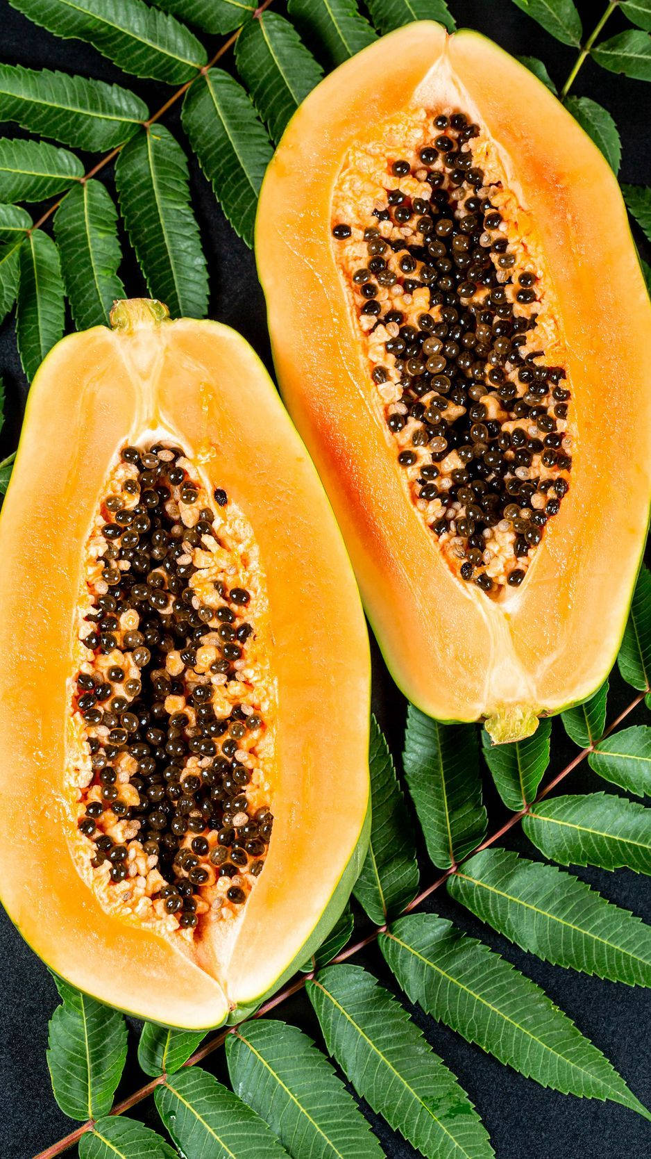 Papaya Fruit And Leaves Background