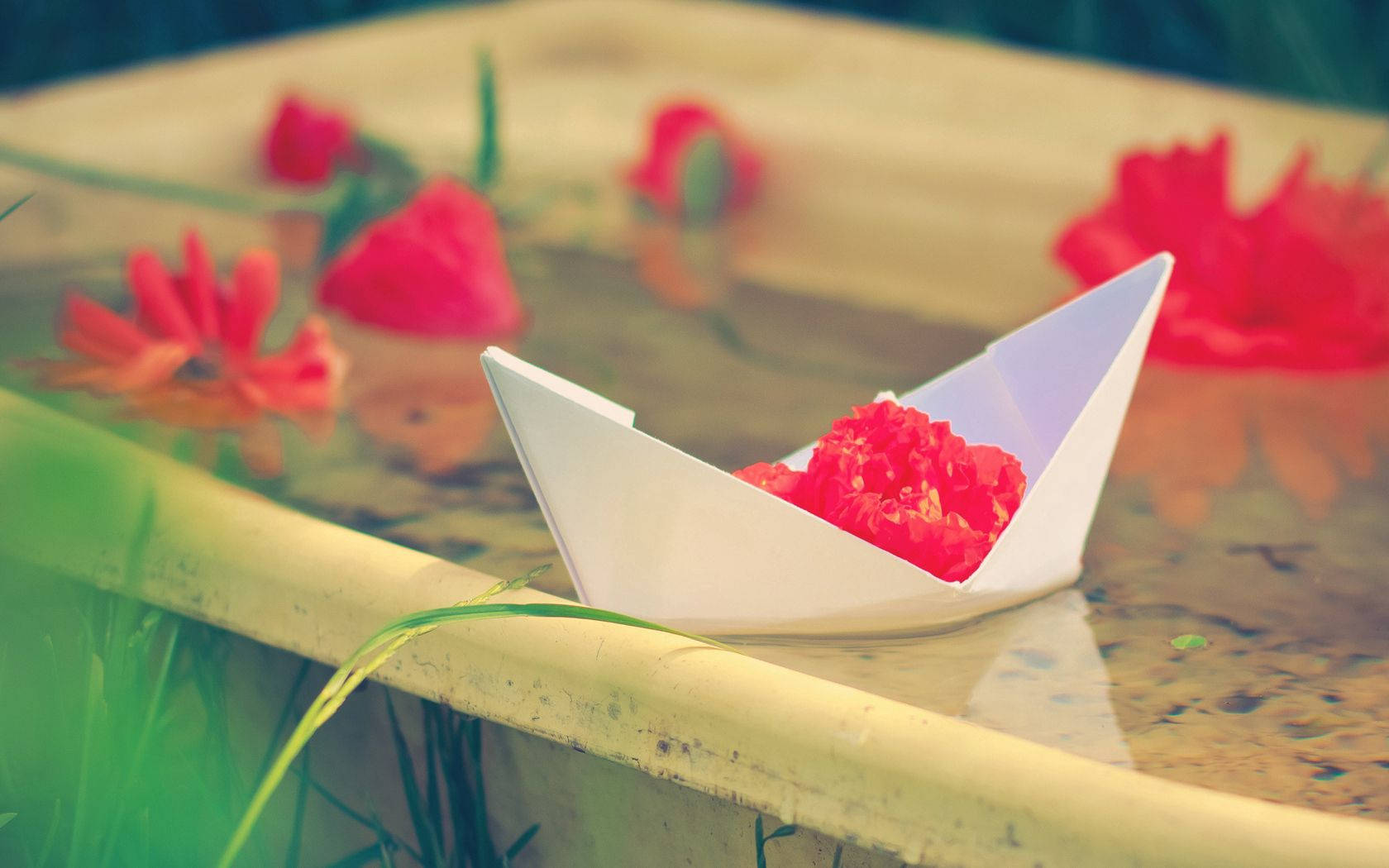 Paper Boat On A Tub Background