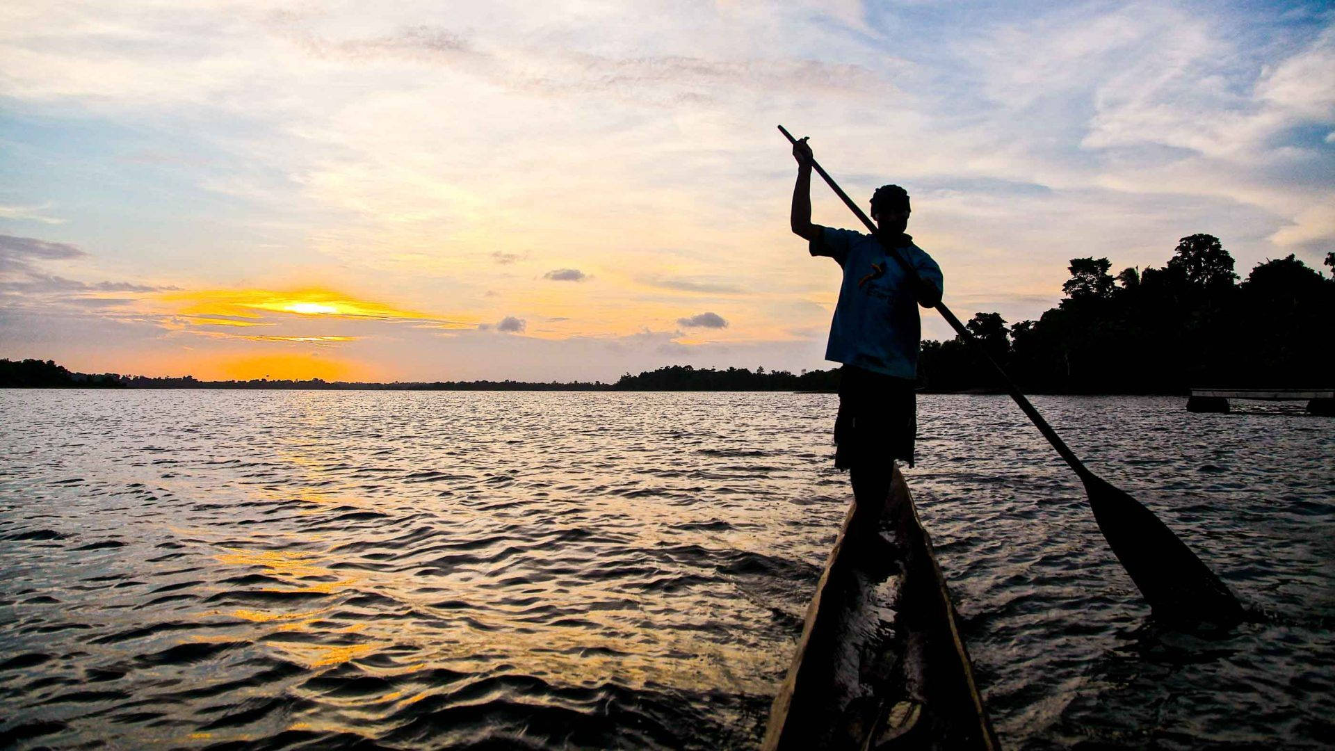 Papua New Guinea Man Rowing Background